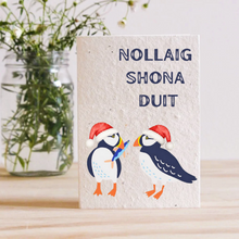 Load image into Gallery viewer, Puffins in Santa hats – Nollaig Shona Duit plantable Christmas seed card