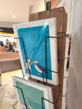Load image into Gallery viewer, Grá – Puffins mini framed Irish print on a shop display
