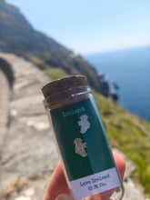 Load image into Gallery viewer, Map of Ireland earrings in Love Ireland Gift Co glass gift jar by the sea
