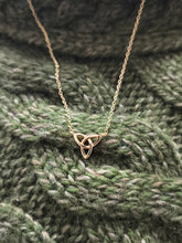Load image into Gallery viewer, Trinity Knot necklace worn – gold-plated sterling silver Celtic jewellery
