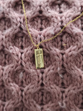 Load image into Gallery viewer, Grá Ogham necklace worn – Irish love necklace in gold-plated sterling silver
