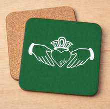 Load image into Gallery viewer, Claddagh Green pot stand – white Claddagh on Irish green with cork backing
