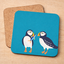 Load image into Gallery viewer, Puffins Grá pot stand – two puffins on blue with cork backing
